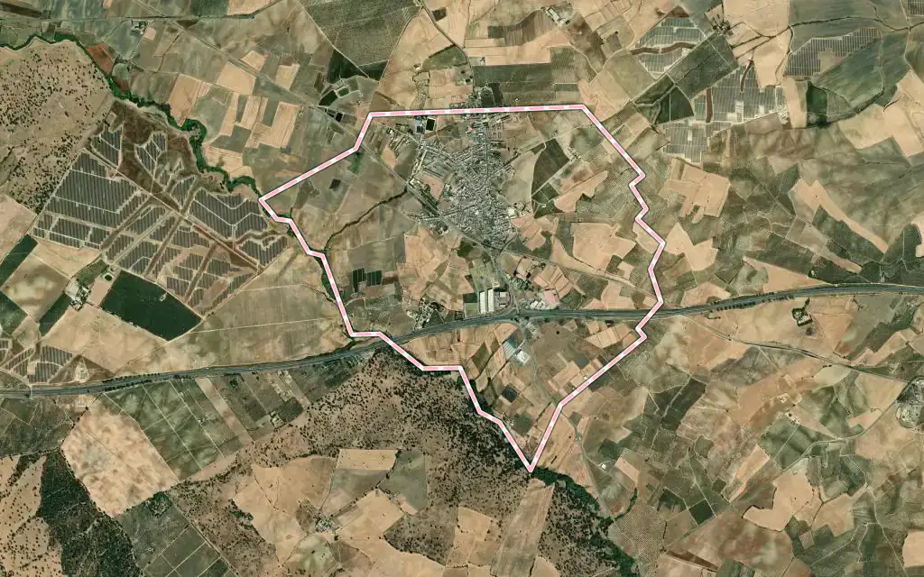 Vista satélite de Carrión de los Céspedes con su contorno administrativo