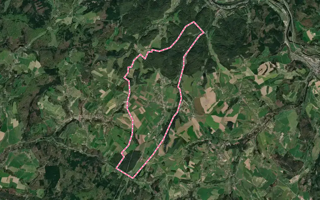 Vue satellite de Dounoux avec ses contours administratifs