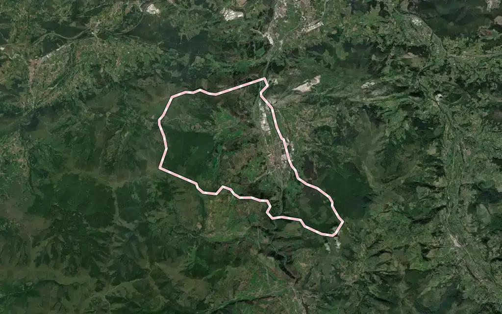 Vista satélite de Los Corrales de Buelna con su contorno administrativo